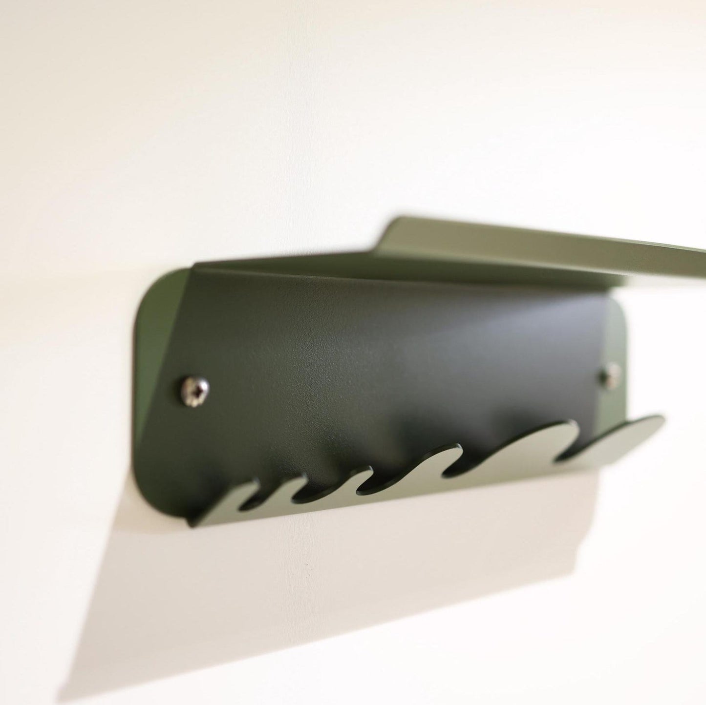 Dark green metal key holder for wall