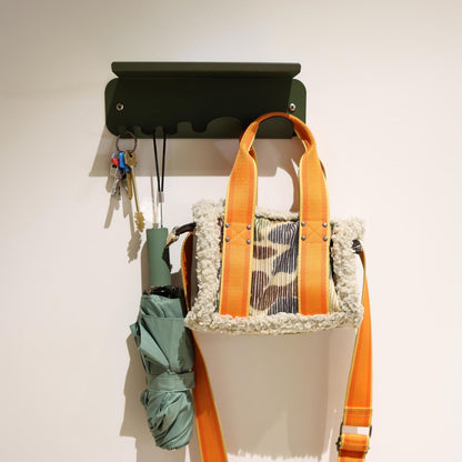 Dark green metal key holder for wall