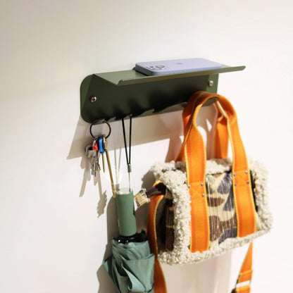 Dark green metal key holder for wall